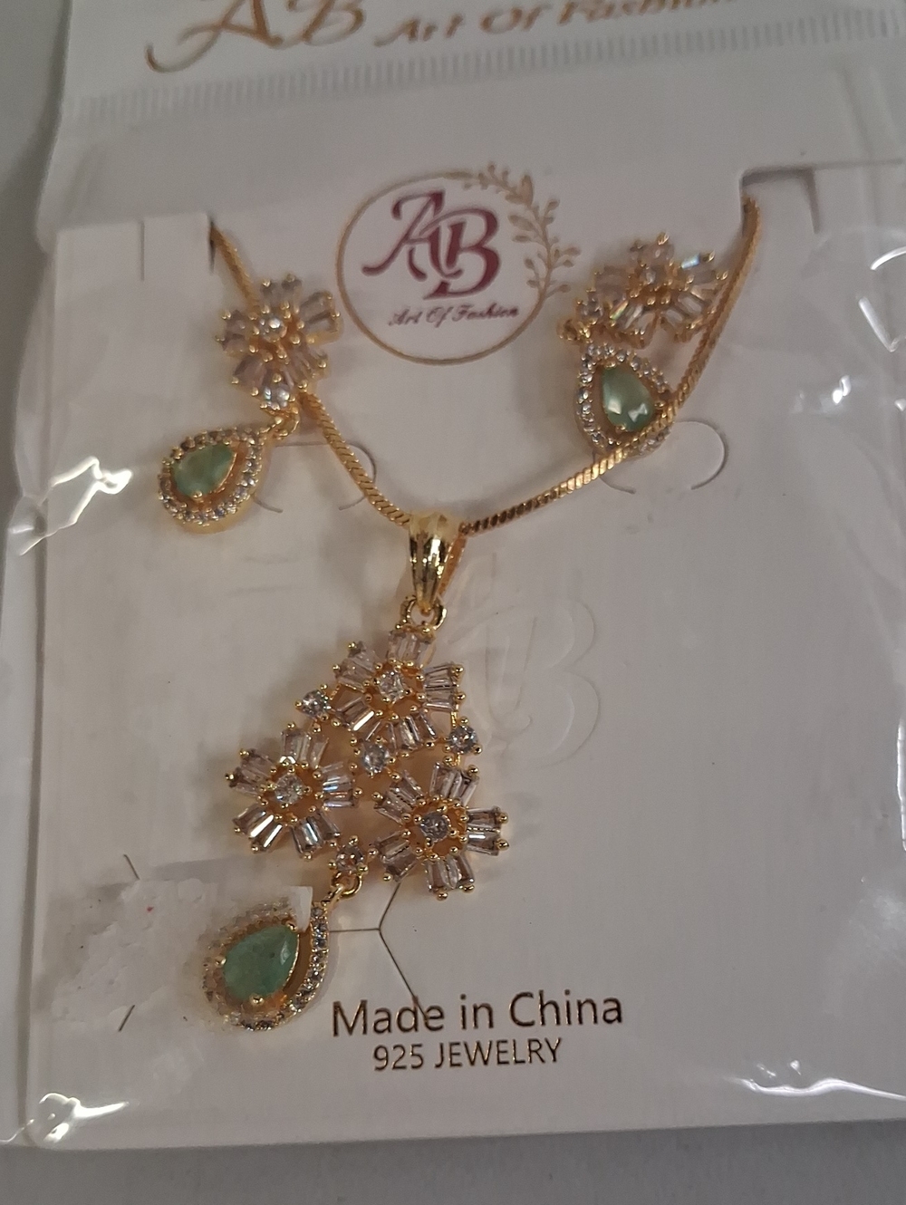 NWT Gold-Plated Floral Pendant Necklace with Green Teardrop Stones